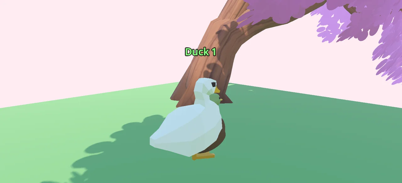 A duck standing under a cherry blossom tree in the Cherry Grove arena